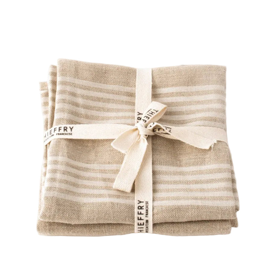 White-striped and natural Belgian linen kitchen towels by Thieffry Frères, folded as a pair.
