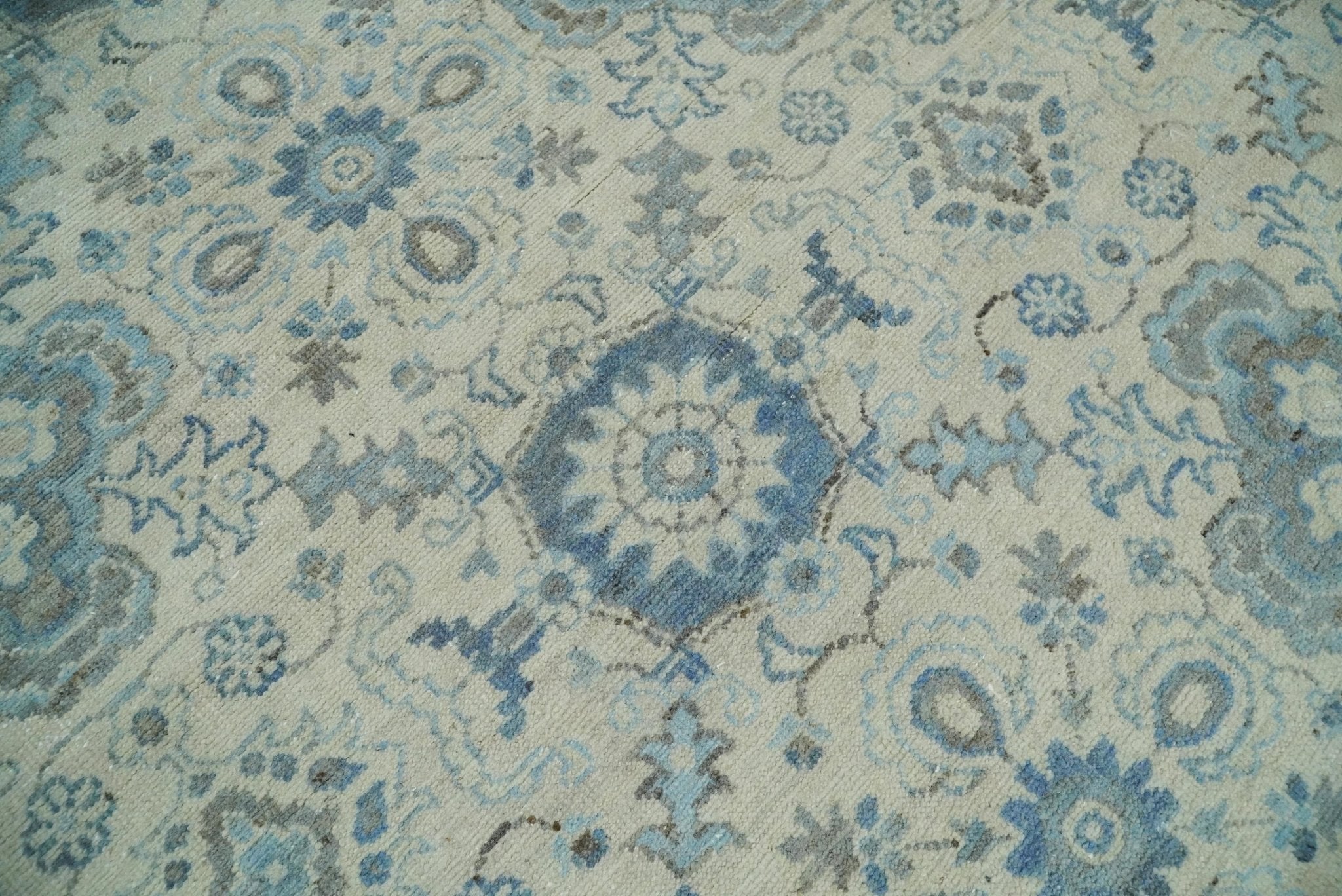 Hand Knotted Traditional Ivory and Blue Oxidized Textured Low Pile Wool Rug