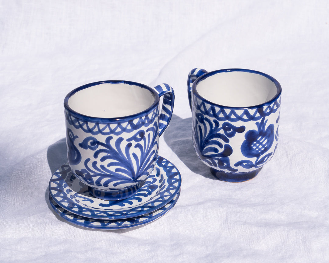 Mug with hand painted designs
