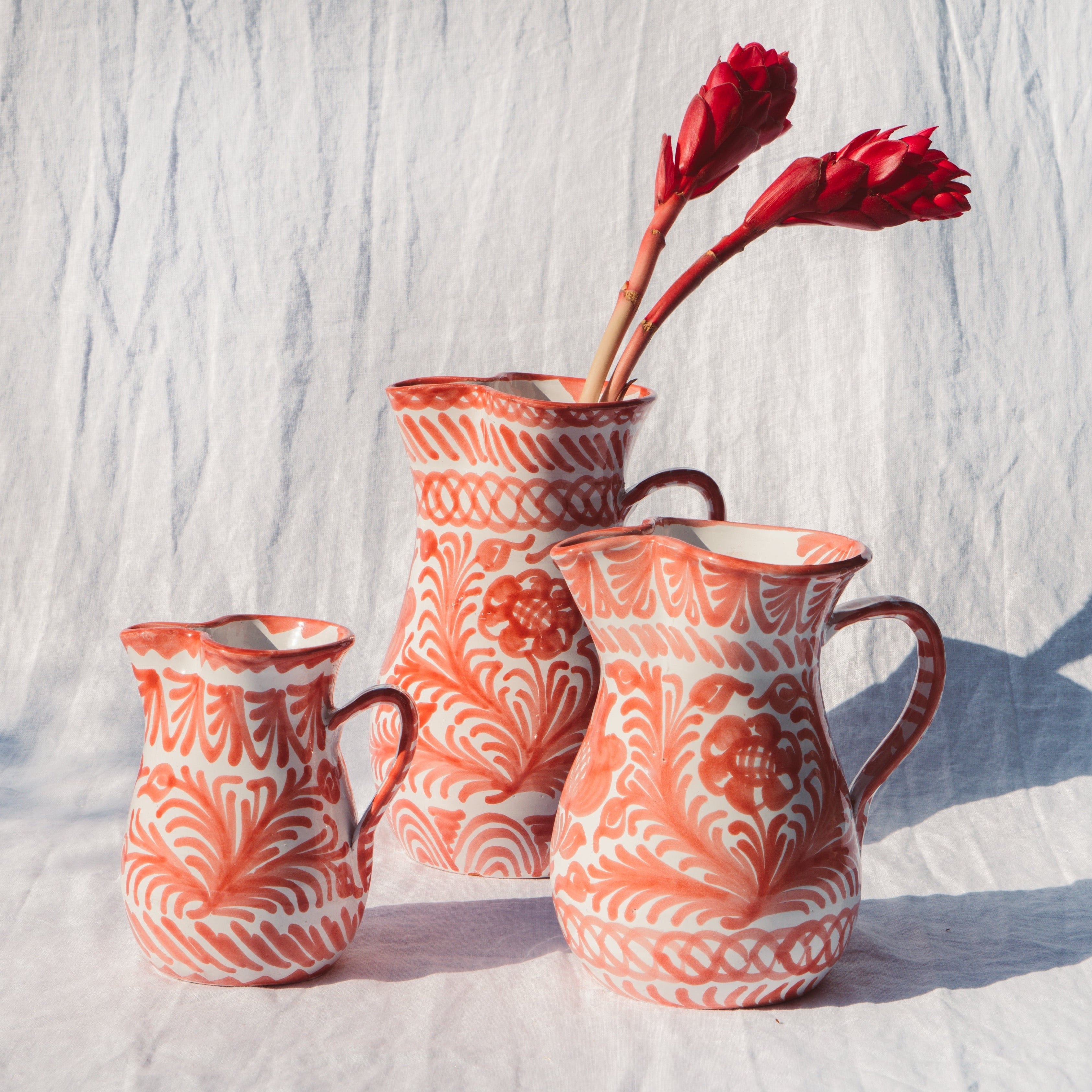 Large pitcher with hand painted designs