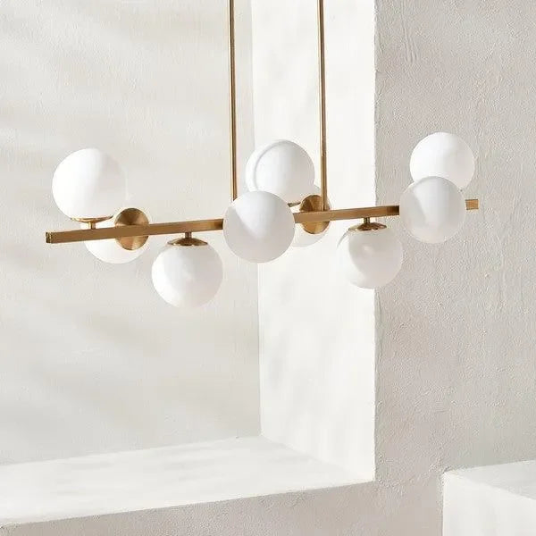 Imara Antique Gold Frame Chandelier in White Globe Shades - The Mayfair Hall