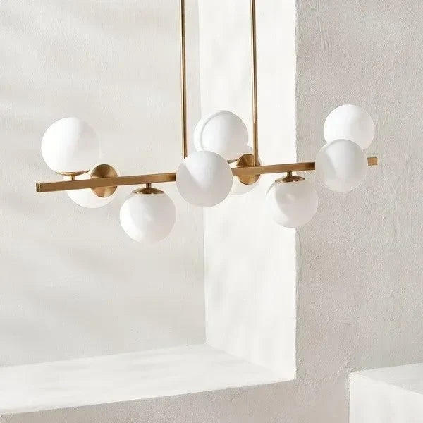 Imara Antique Gold Frame Chandelier in White Globe Shades - The Mayfair Hall