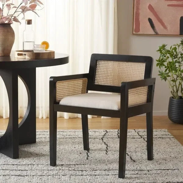 Patrina Rattan Armed Dining Chair in Black with Cushion - The Mayfair Hall