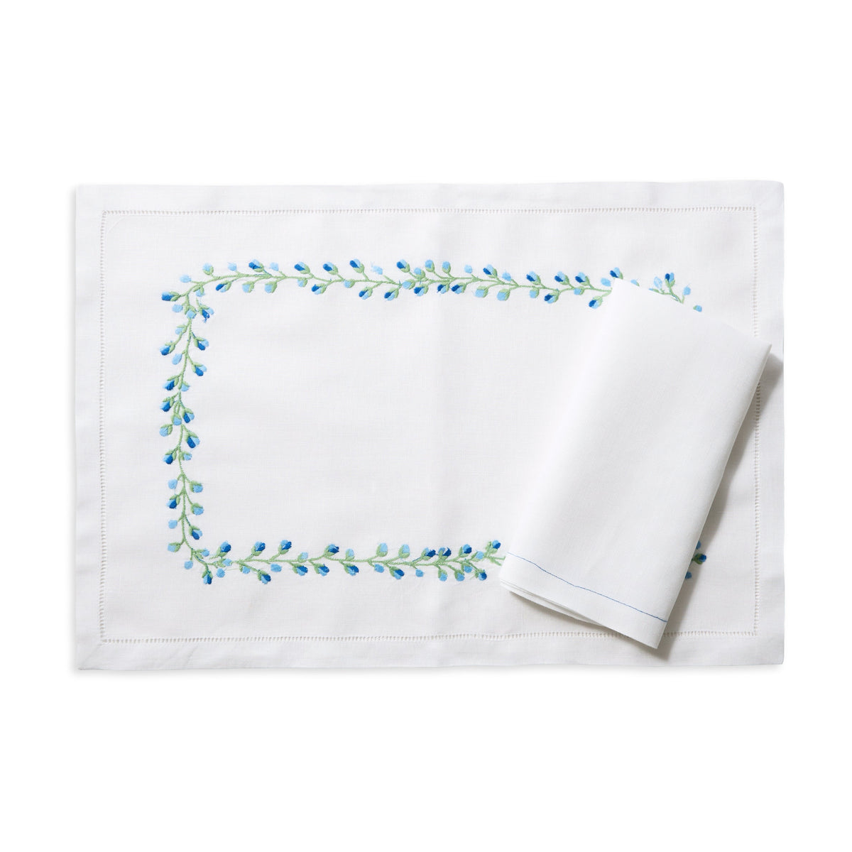 Oasis Linen Dinner Napkins in White and Blue by Isla Capricho — Set of 4