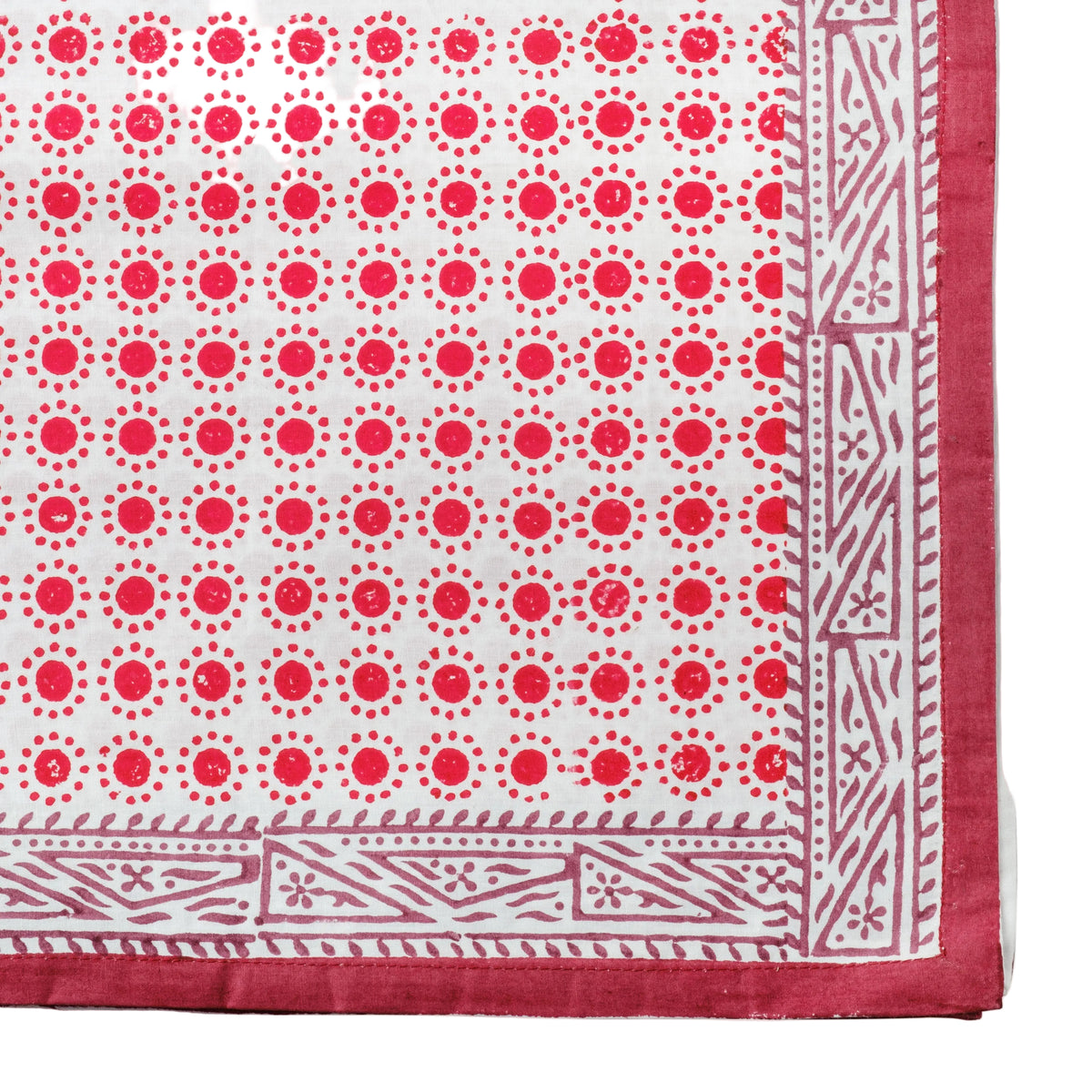 Dot Print Cotton Tablecloth in Red — red dot-print fabric and border shown close-up.