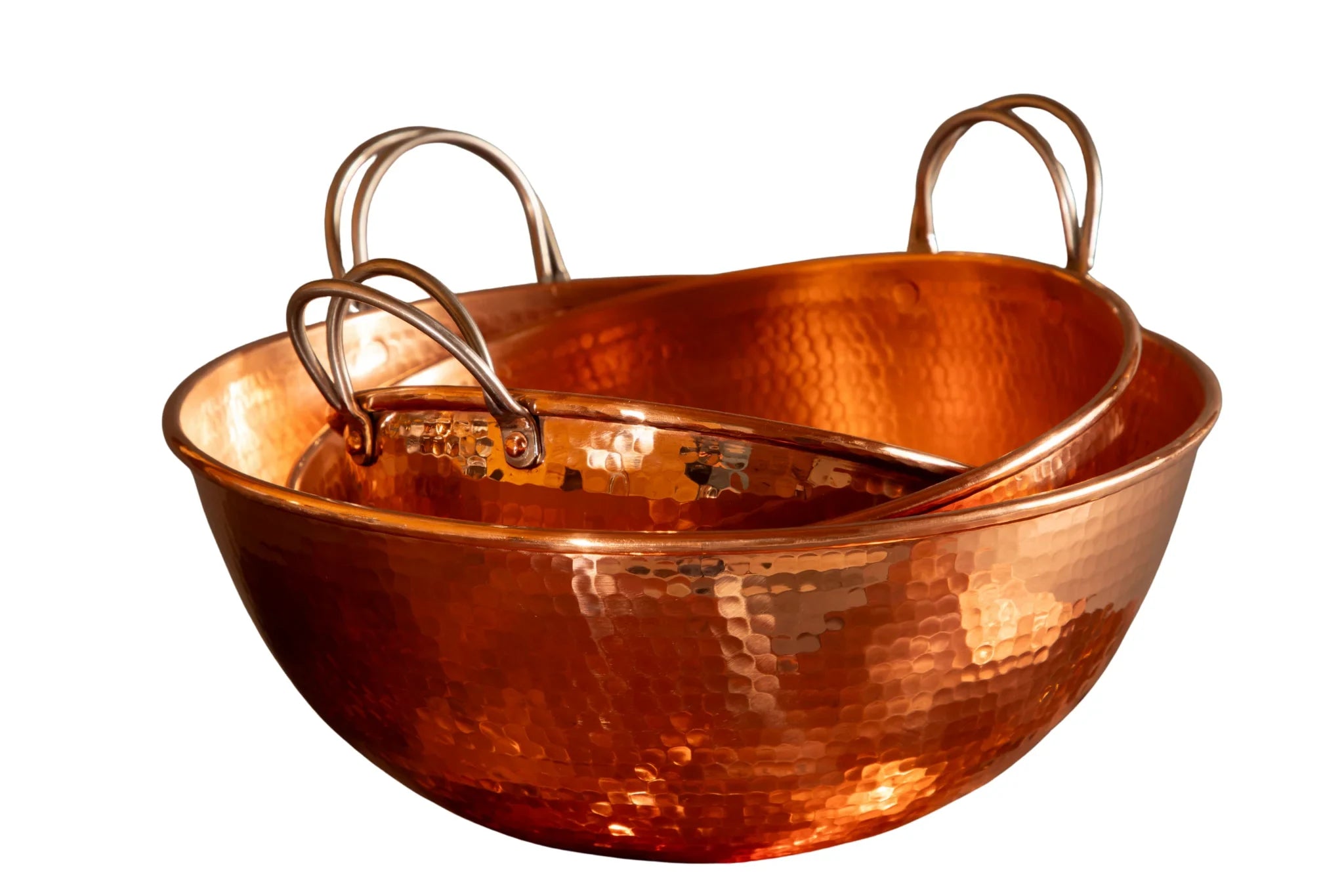 Copper bowl with handles on a white background