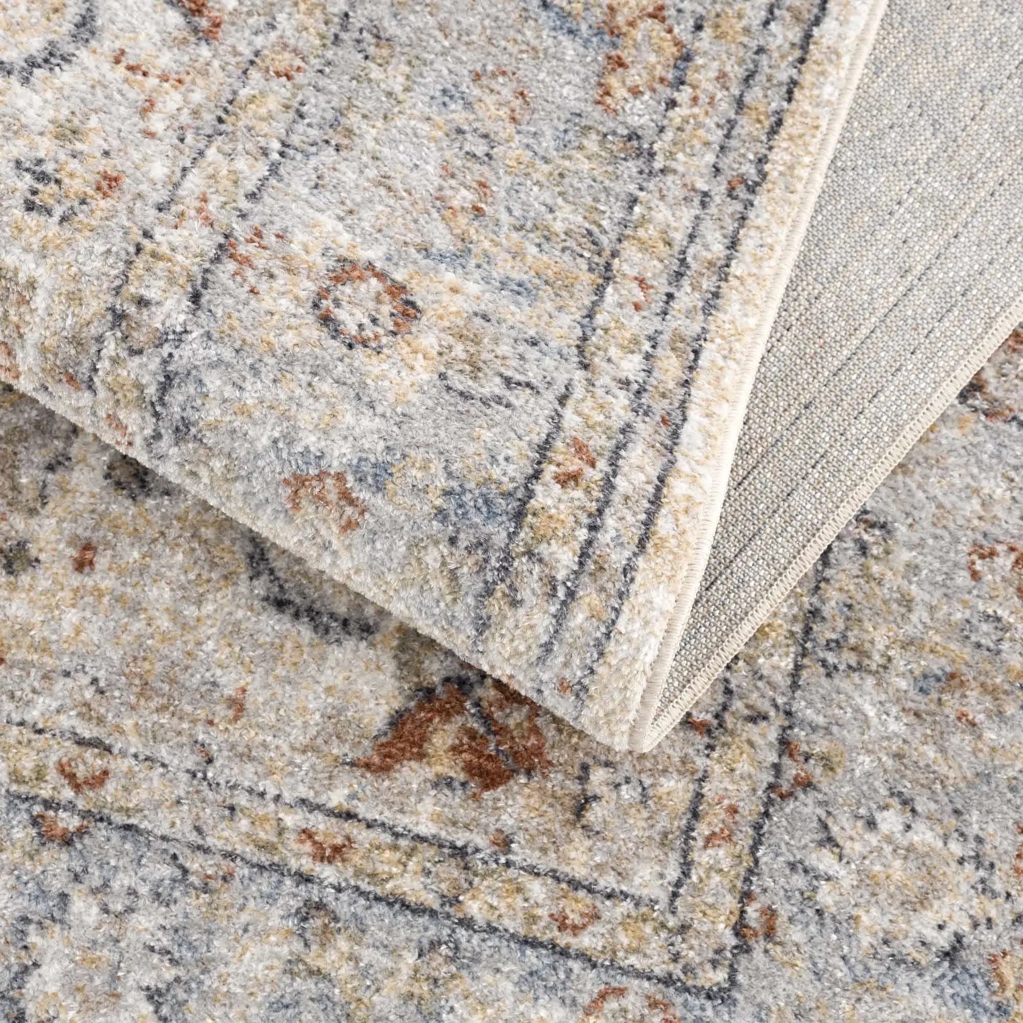Emke Cream Washable Area Rug - The Mayfair Hall