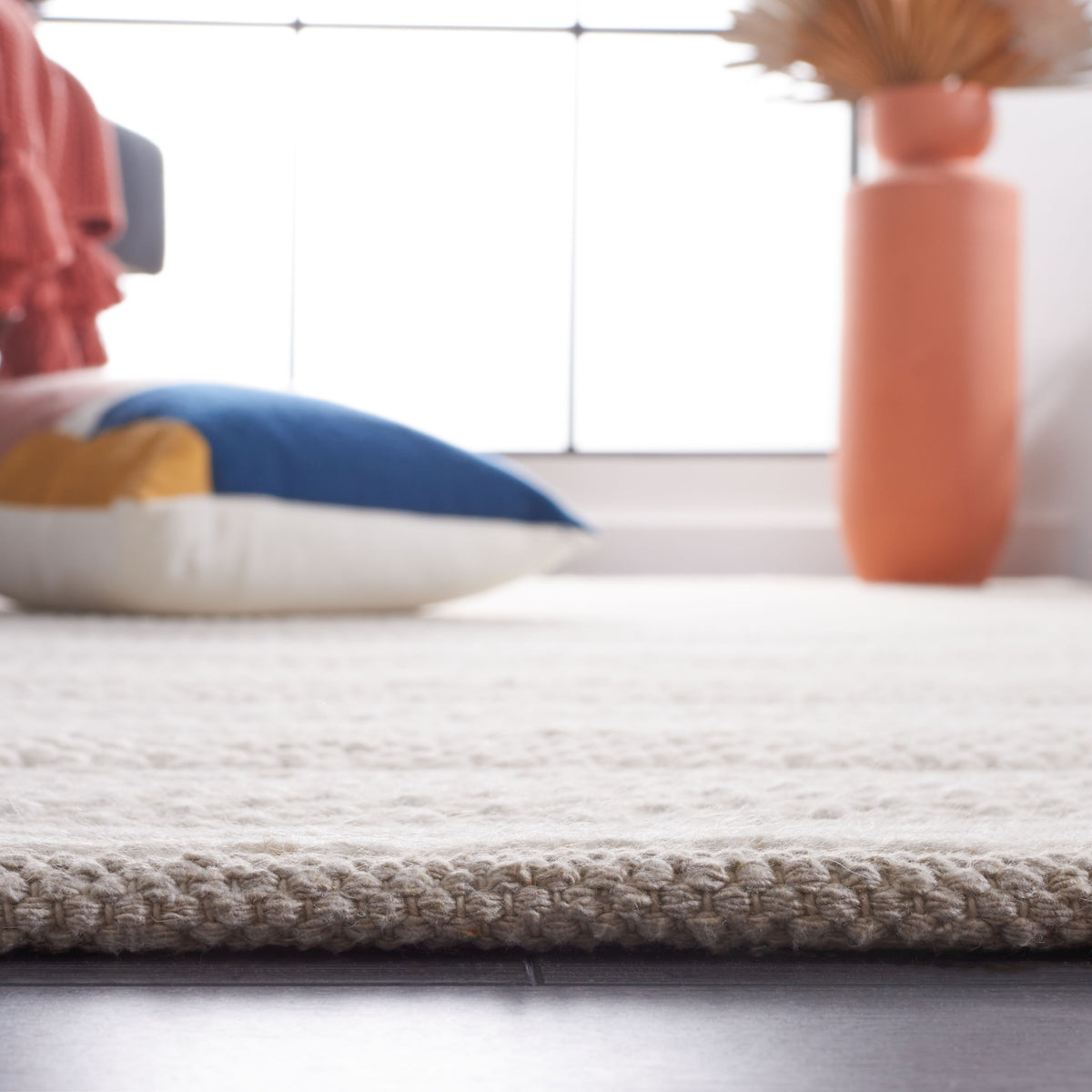 Natura Coastal Handwoven Area Rug in Ivory