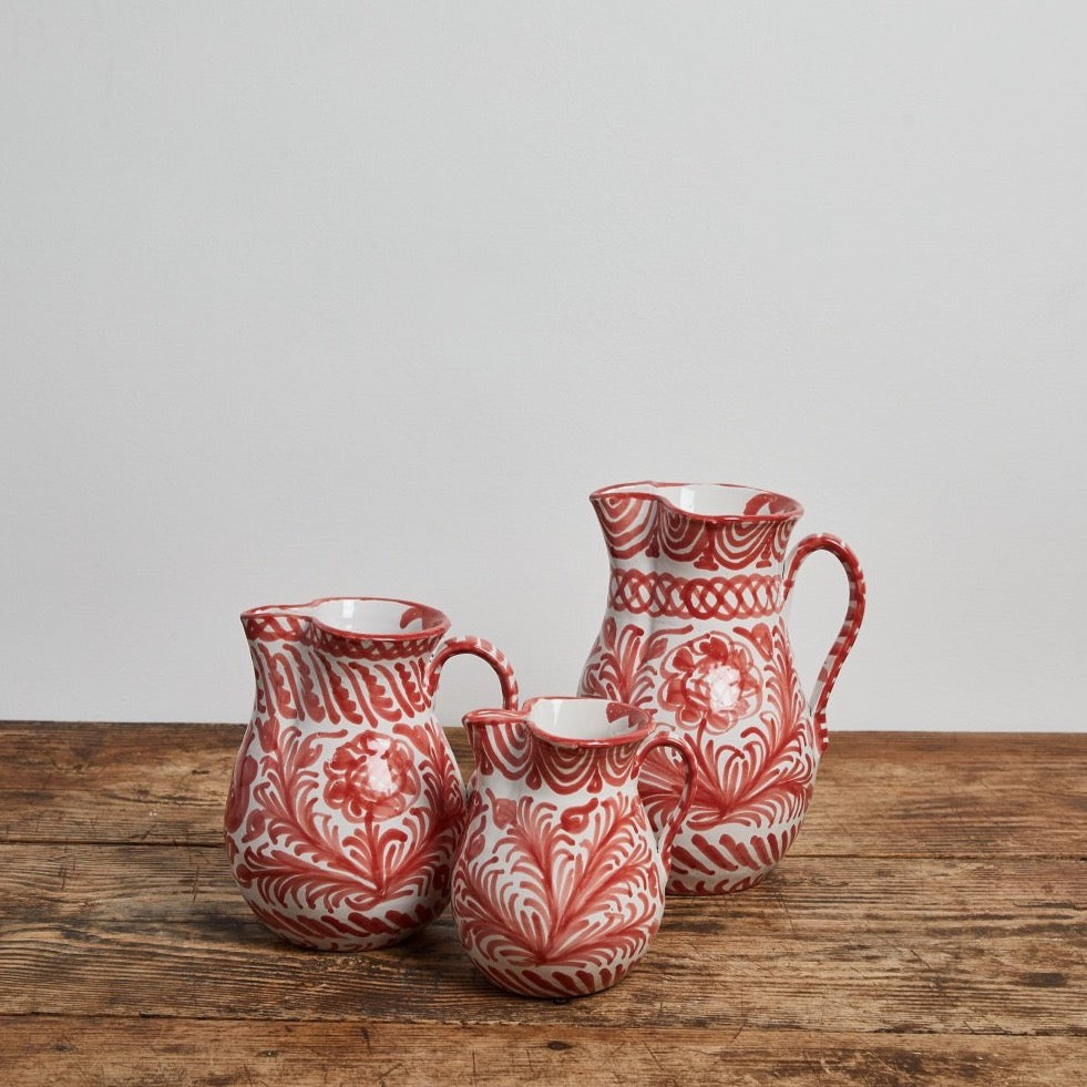 Large pitcher with hand painted designs