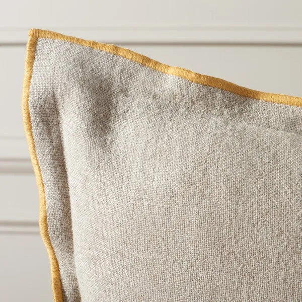 Amal Throw Pillow in Natural with Mustard Border