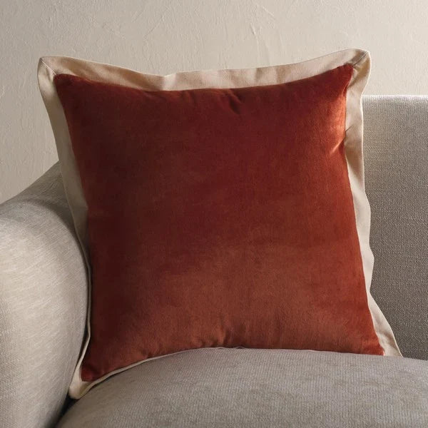 Jordy Cotton Throw Pillow in Burnt Orange with Natural Border