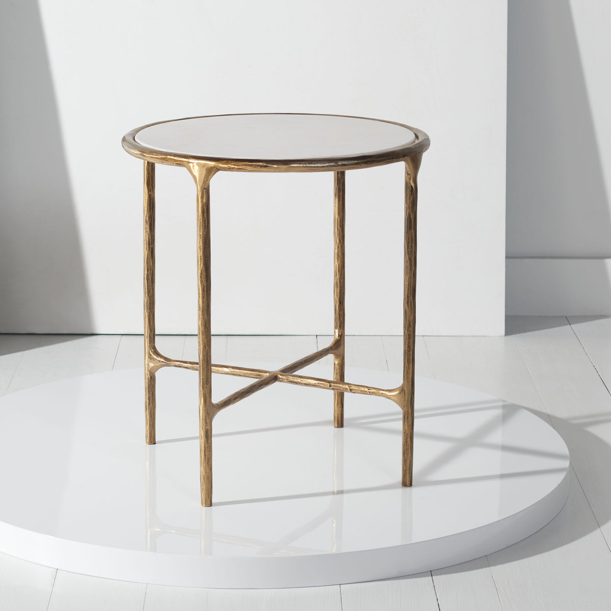 Jessa Forged Metal Round End Table in Brass and White