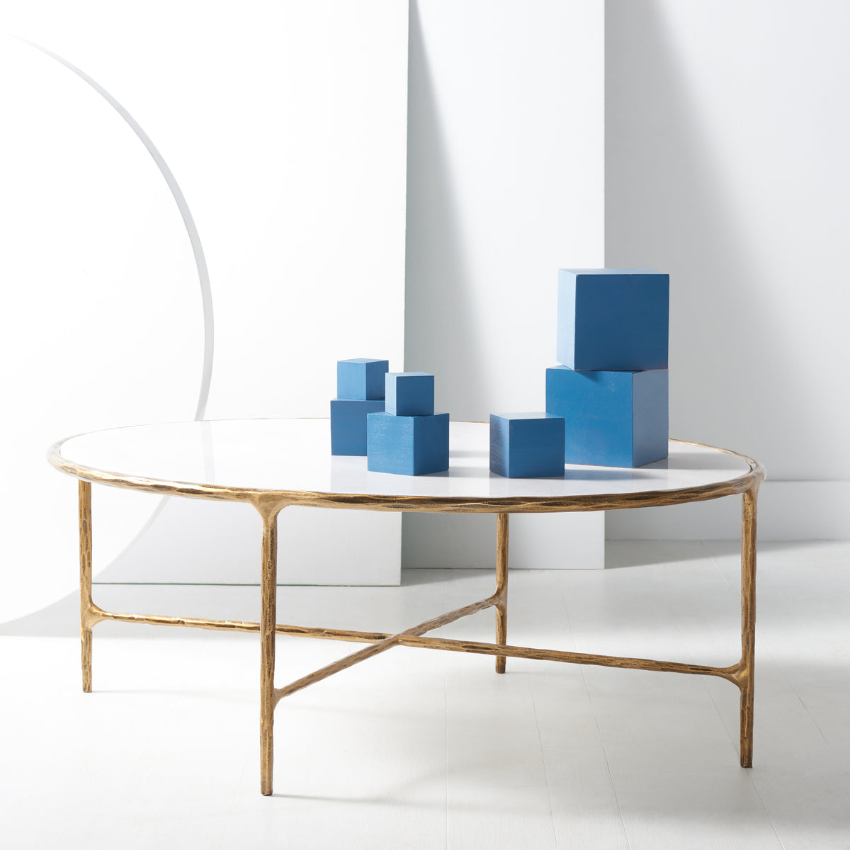 Jessa Oval Metal Coffee Table in Brass and White