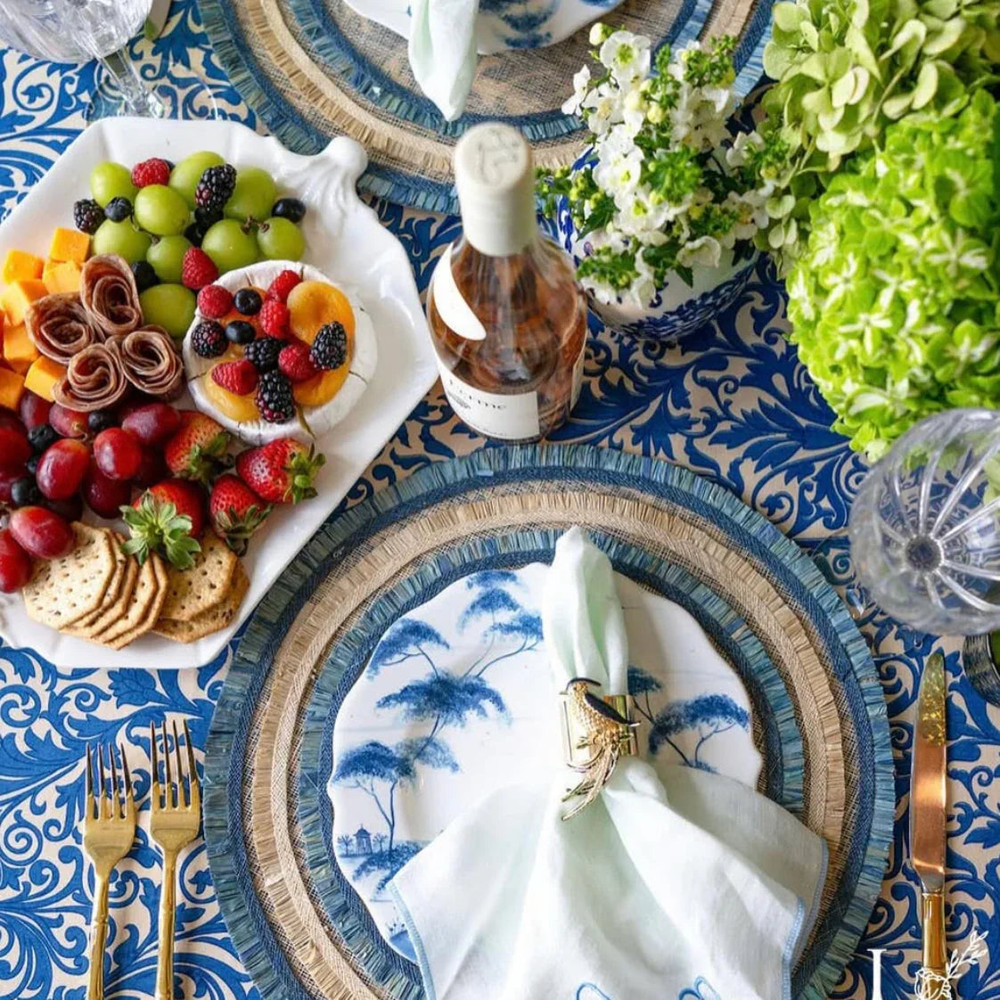 Ruffle edge straw placemat, indigo, set of four - The Mayfair Hall