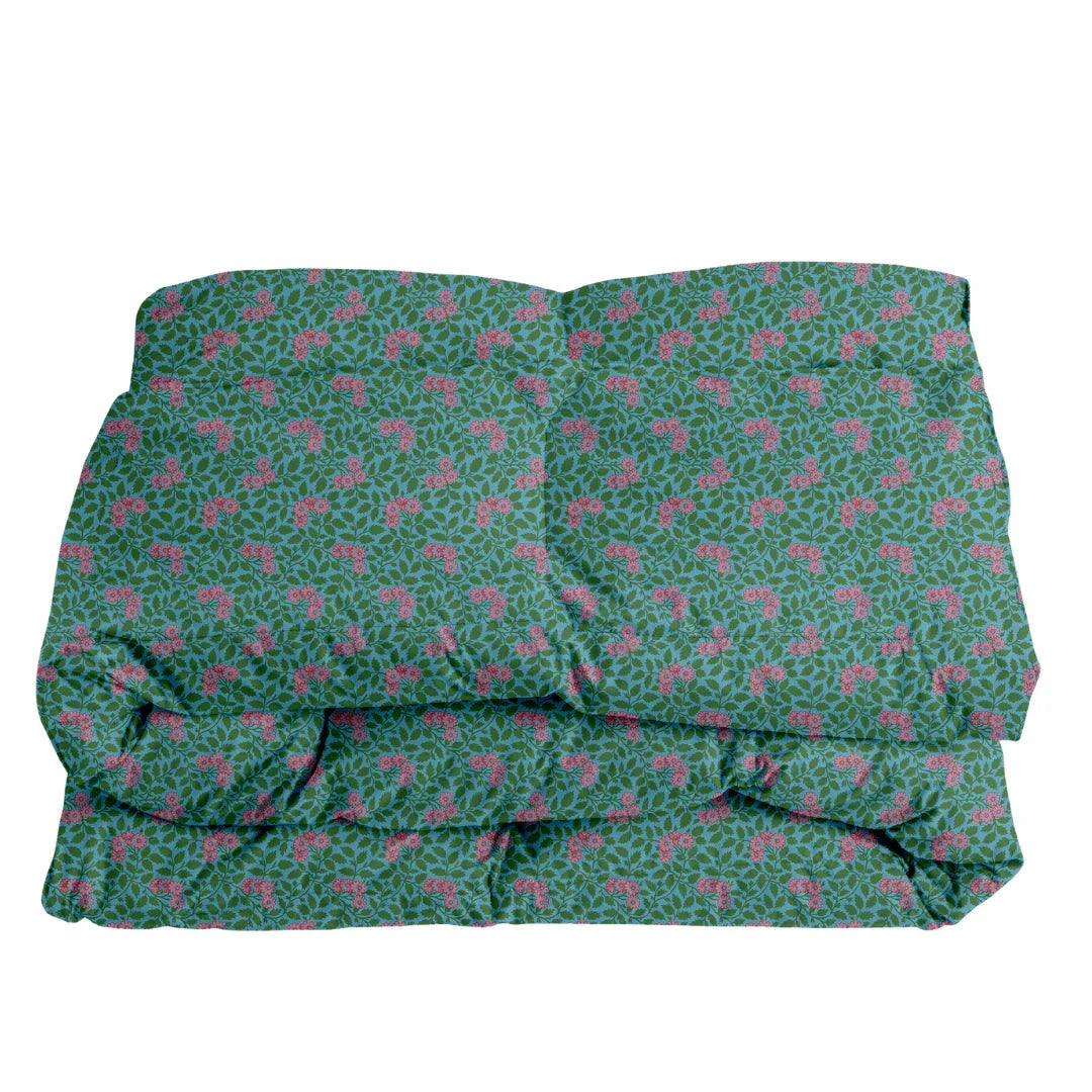 Maggie in Emerald & Orchid on Storm Comforter - The Mayfair Hall