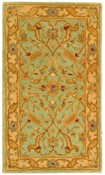 Antiquity Wool Rug in Teal and Beige - The Mayfair Hall