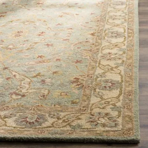 Antiquity Wool Rug in Teal and Beige - The Mayfair Hall