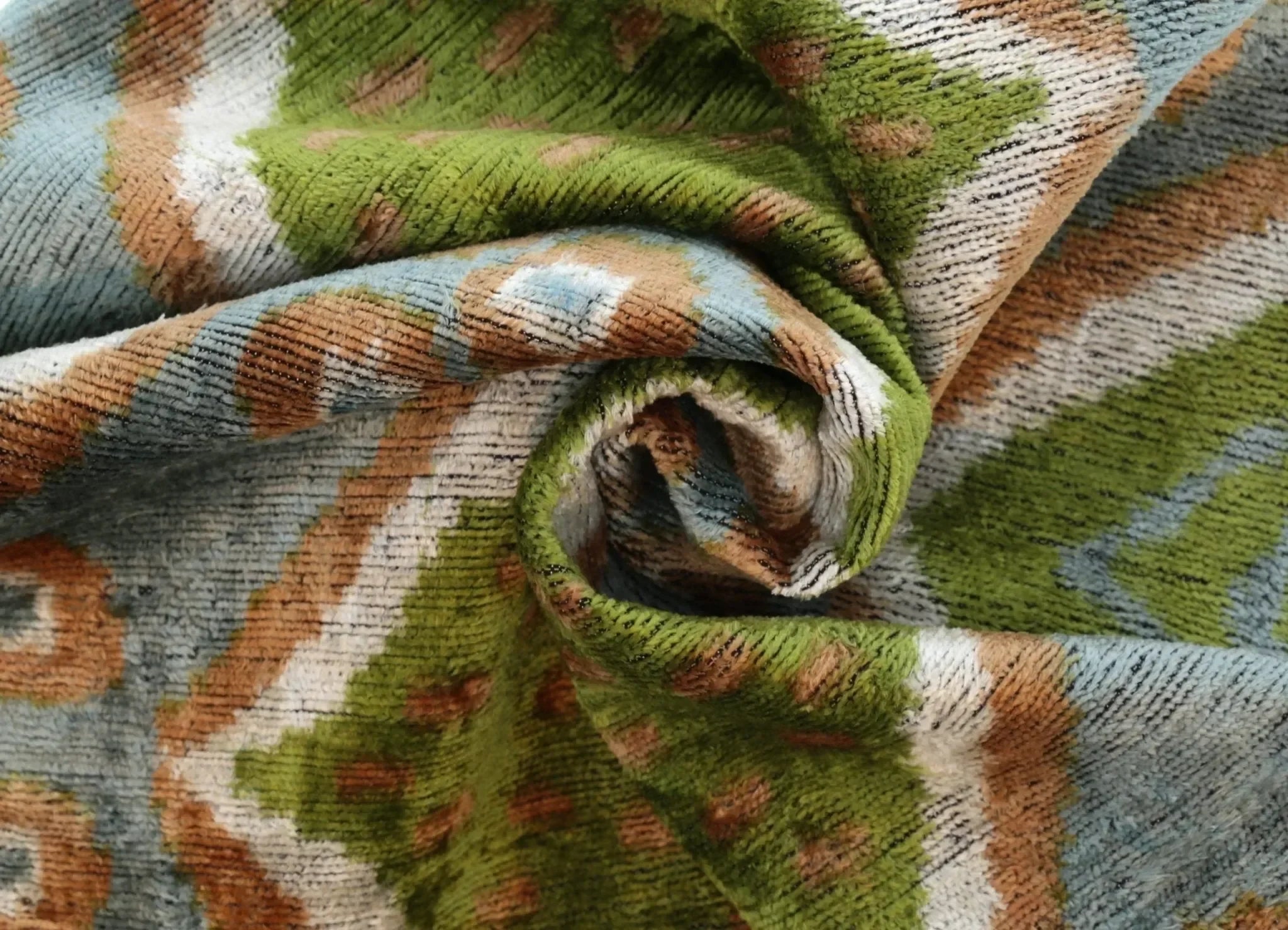 Handmade Velvet Throw Pillow with Green and Blue Geometric Ikat Design - High-Quality 20x20 Inch Decorative Accent with Premium Down Feather Insert - The Mayfair Hall