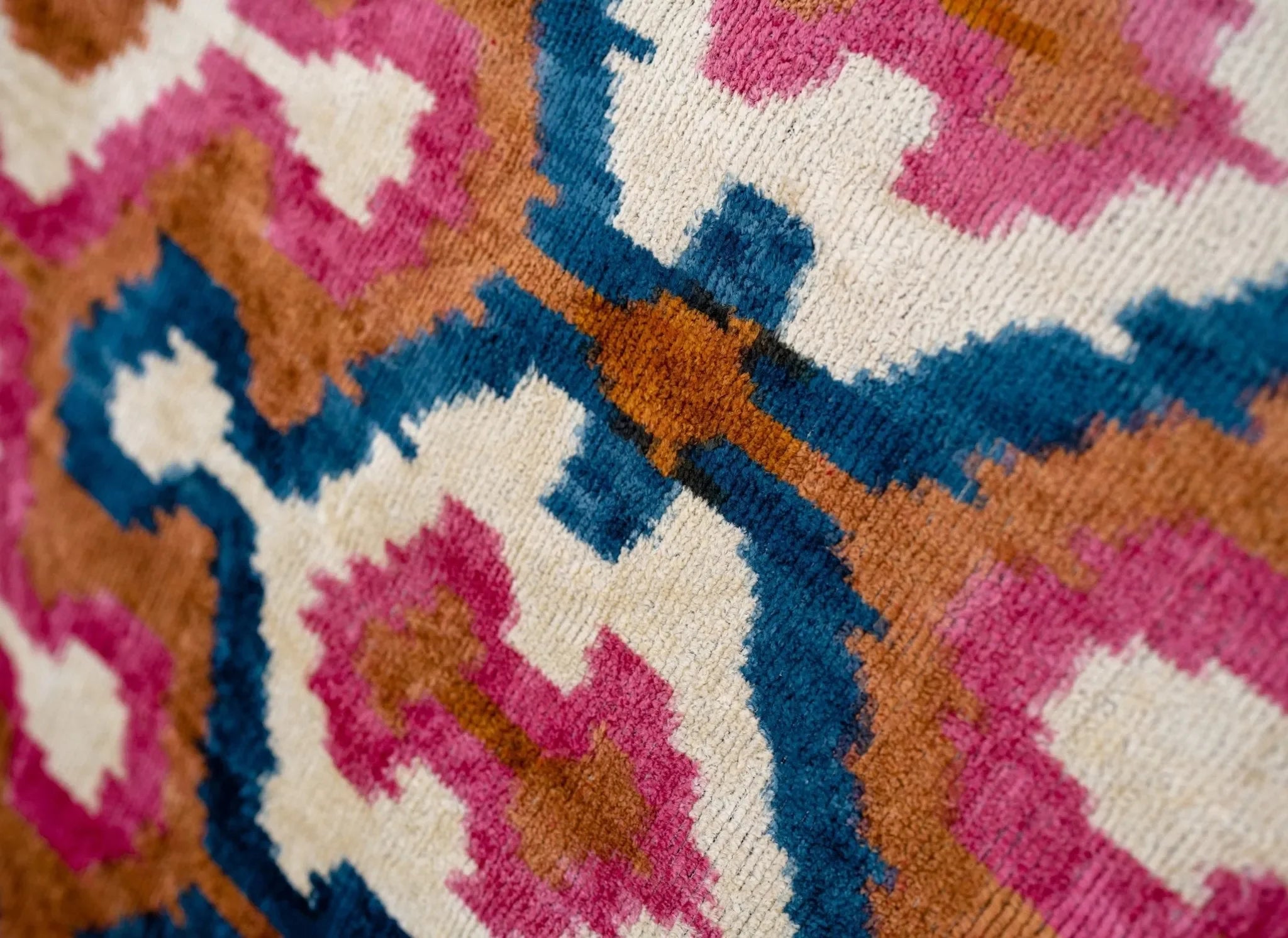 Handmade Velvet Throw Pillow with Pink, Blue, and Tan Ikat Design - High-Quality 20x20 Inch Decorative Accent with Premium Down Feather Insert - The Mayfair Hall
