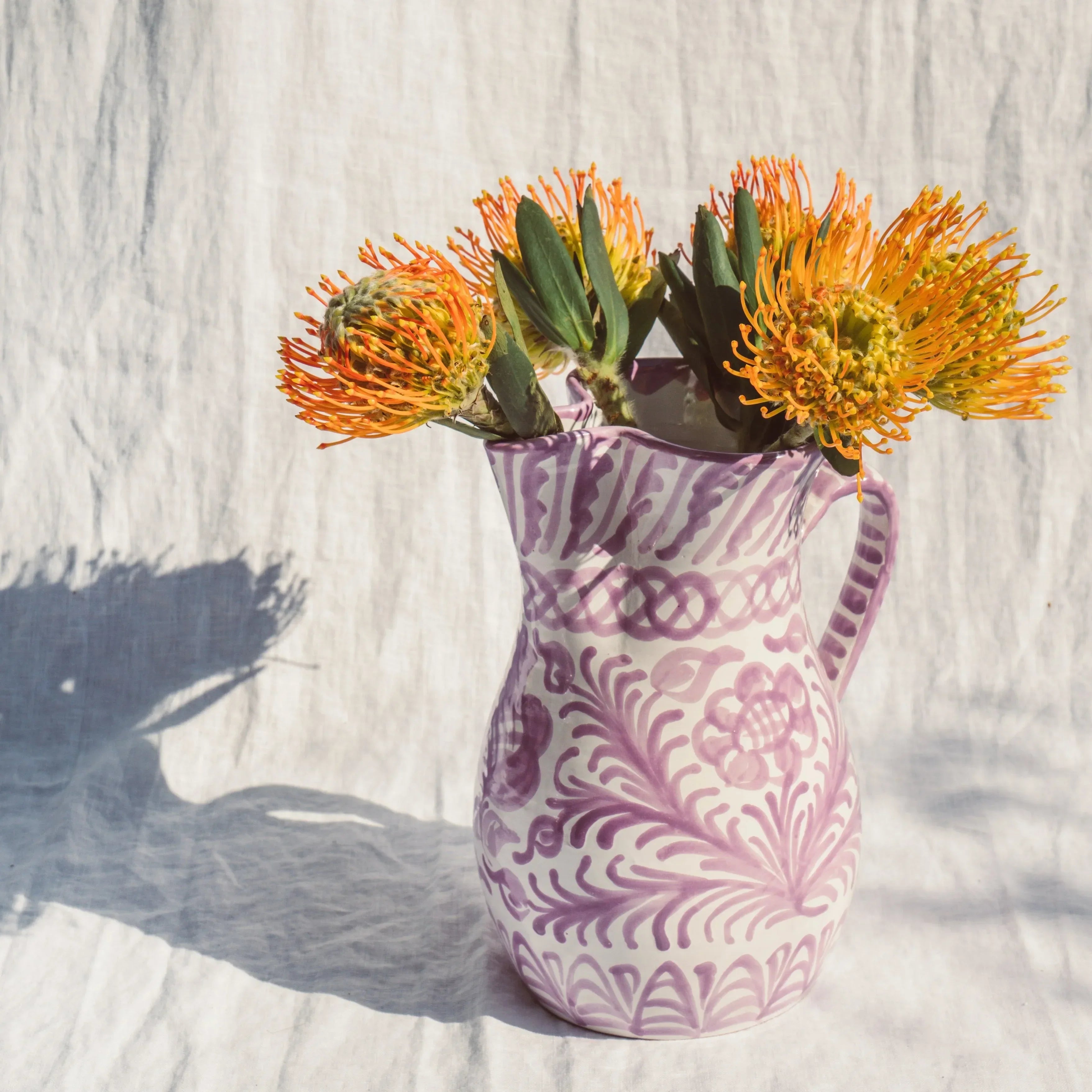 Large pitcher with hand painted designs - The Mayfair Hall