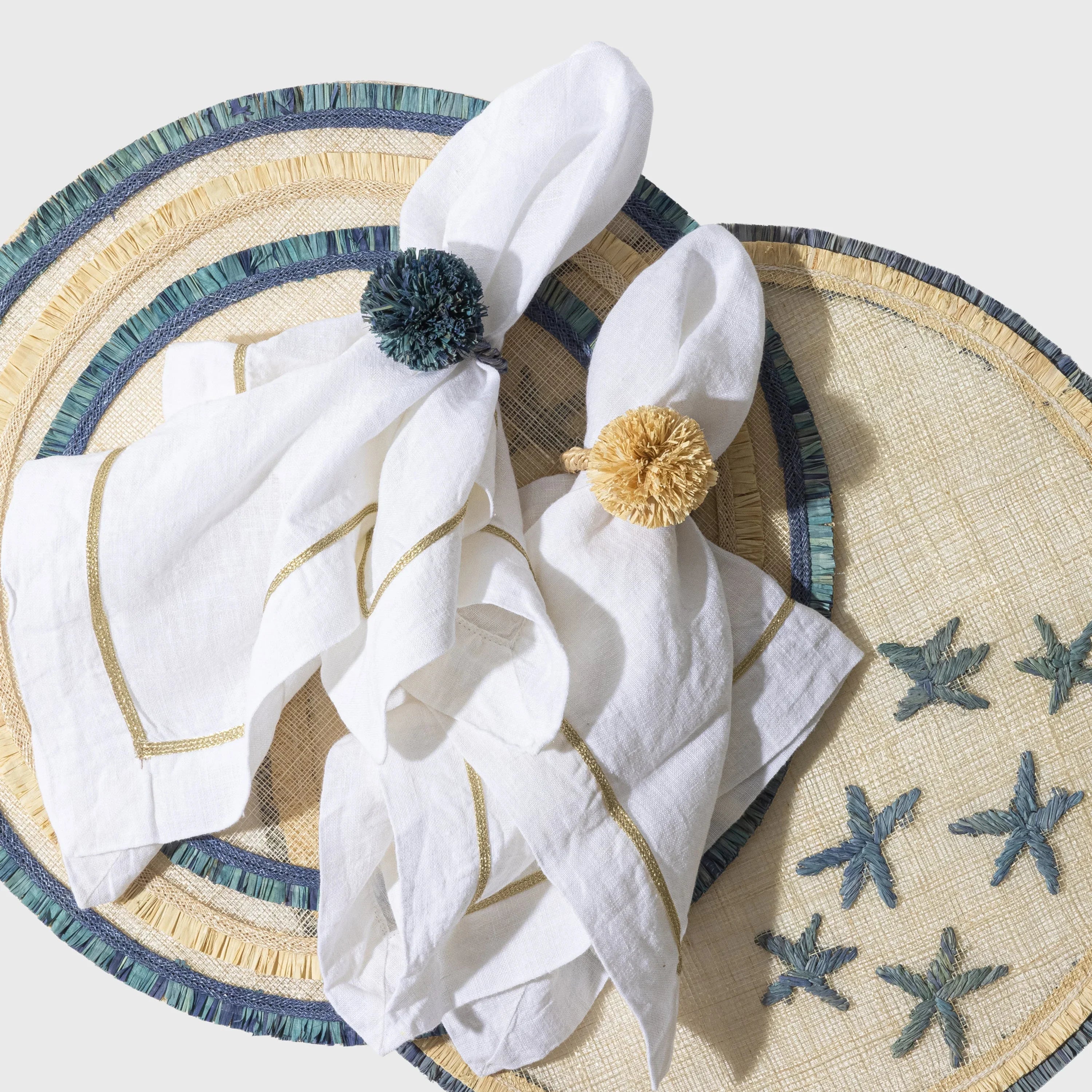 Ruffle edge straw placemat, indigo, set of four - The Mayfair Hall
