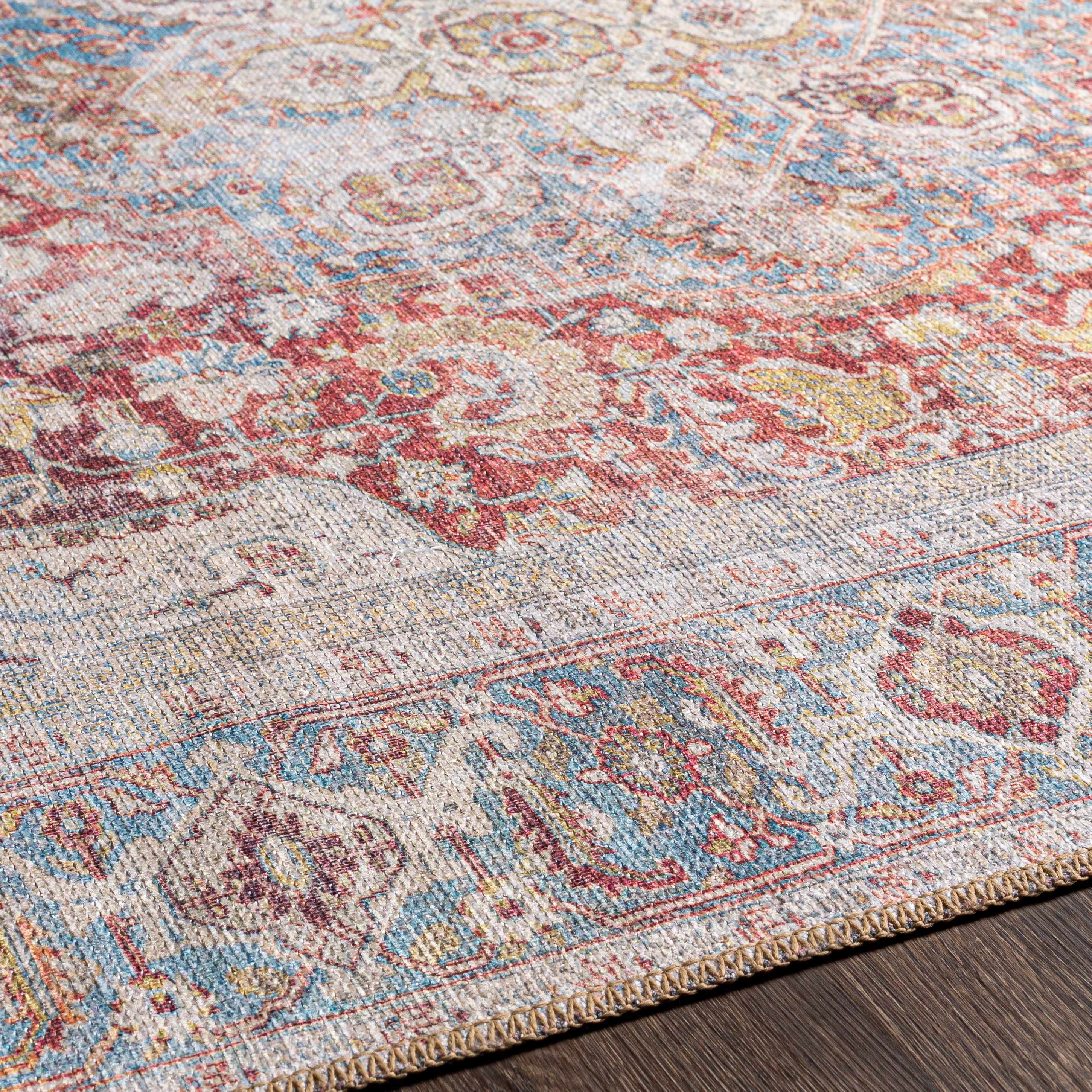 Leeston Vintage Polyester Area Rug in Cream and Rust