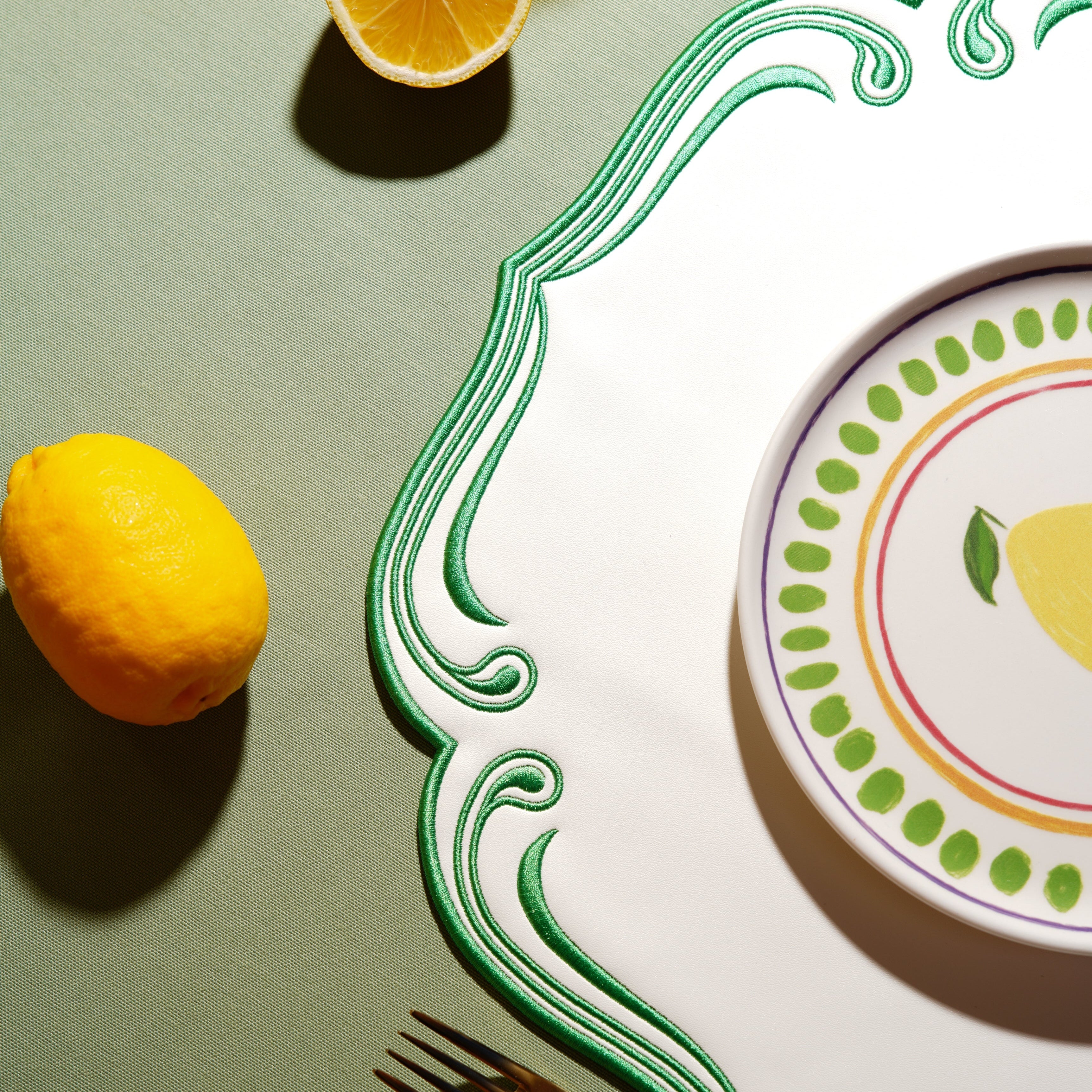 ROYAL WHITE GREEN TRIM SQUARE FAUX LEATHER PLACEMAT