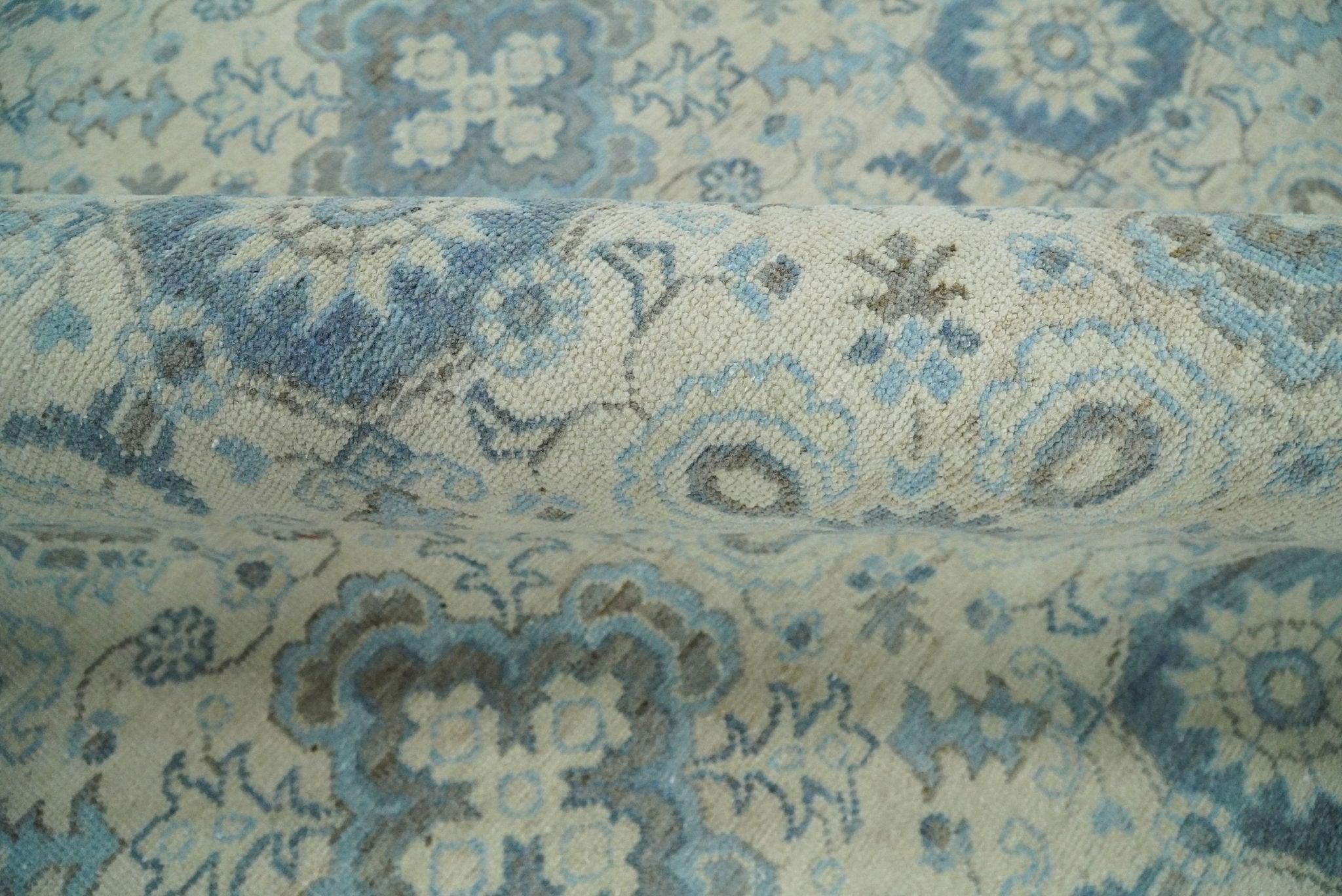 Hand Knotted Traditional Ivory and Blue Oxidized Textured Low Pile Wool Rug