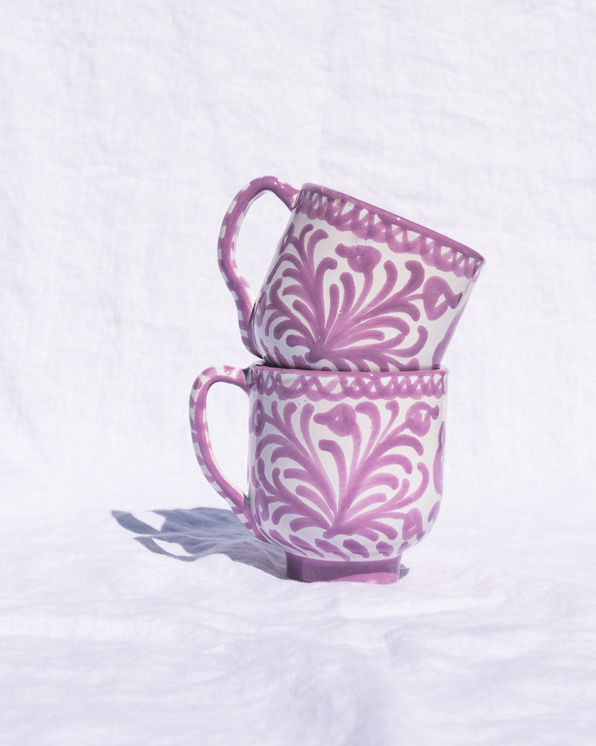 Mug with hand painted designs