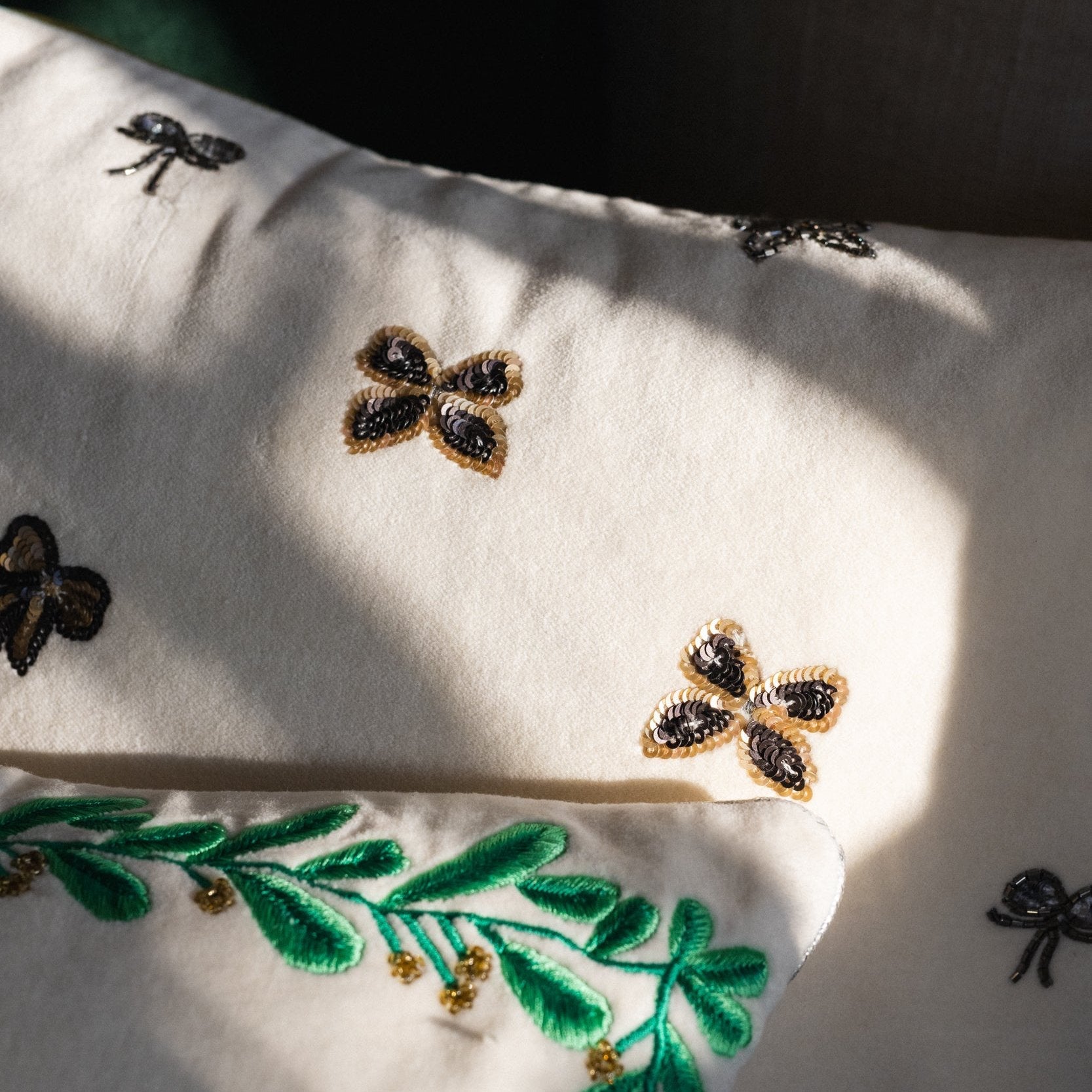 Embroidered bow pillow, cream cotton velvet