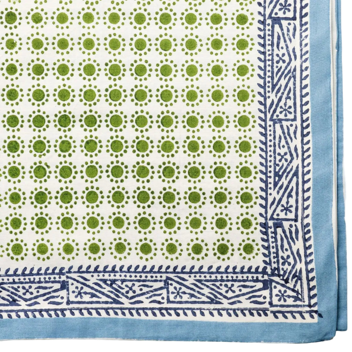 Dot Print Cotton Tablecloth in Green — green dot-print fabric and blue border shown close-up.