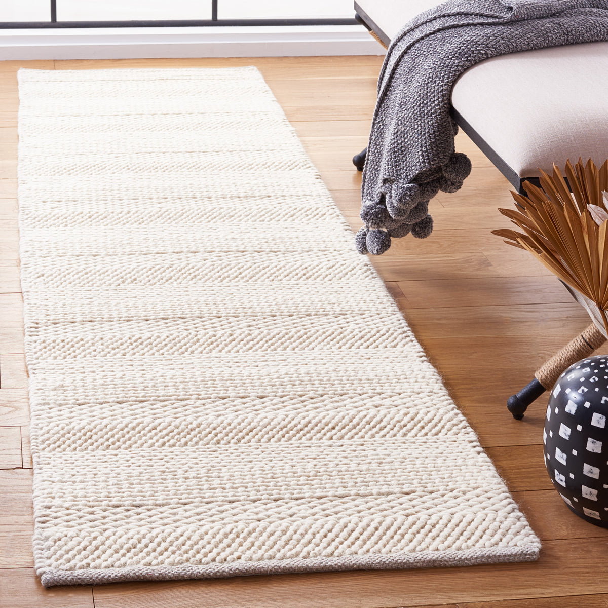 Natura Coastal Handwoven Area Rug in Ivory