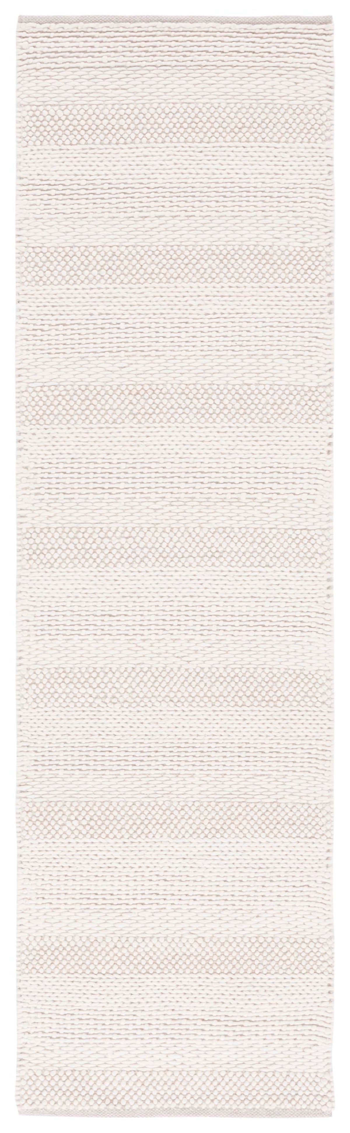 Natura Coastal Handwoven Area Rug in Ivory