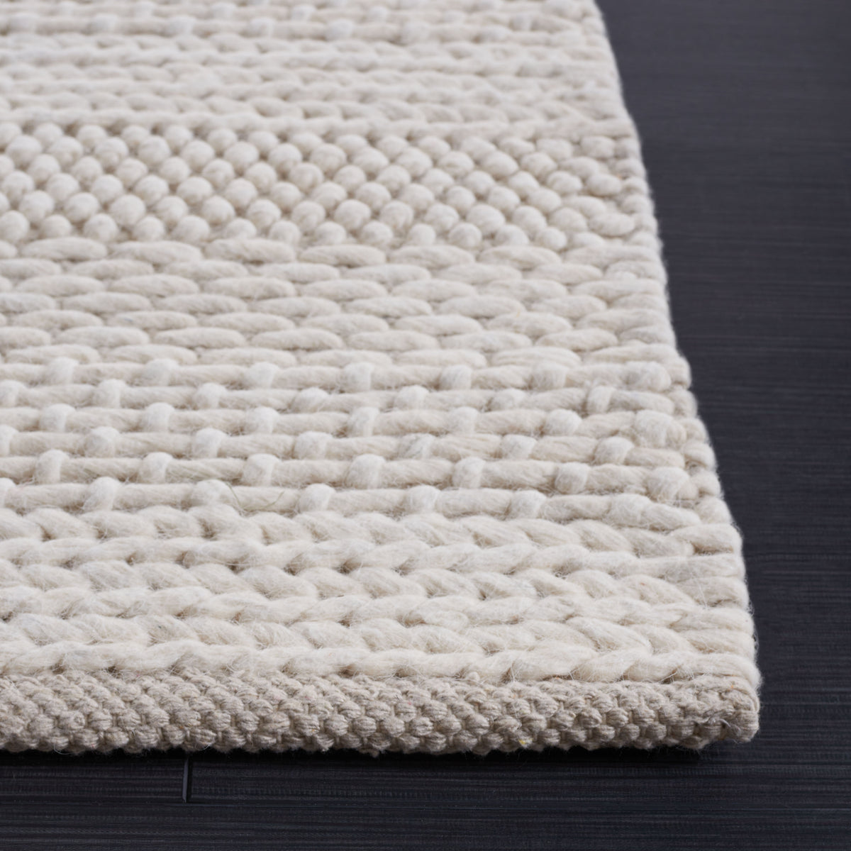 Natura Coastal Handwoven Area Rug in Ivory