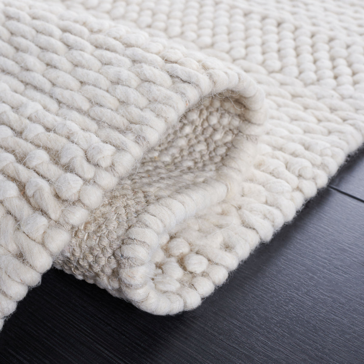 Natura Coastal Handwoven Area Rug in Ivory