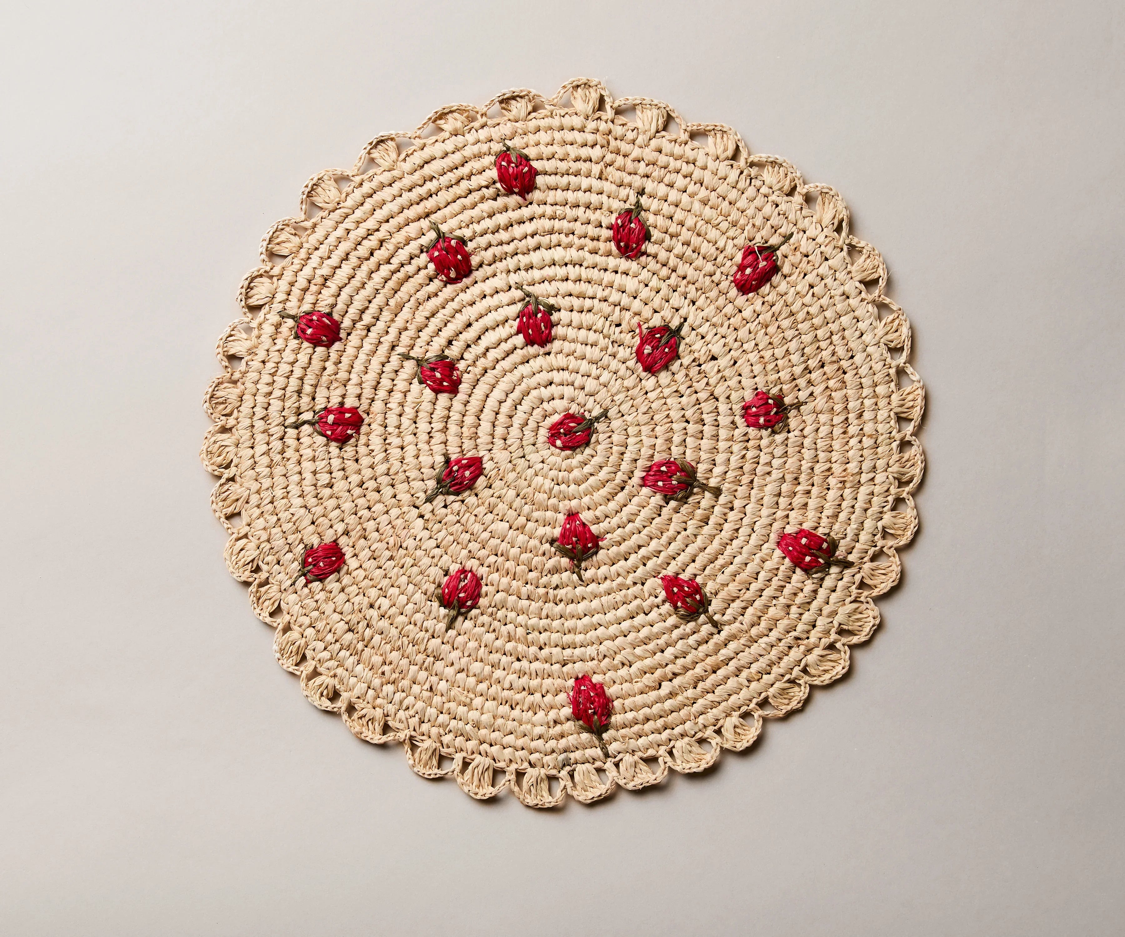 Scattered Strawberry Hand-Crocheted Raffia Palm Round Placemat - The Mayfair Hall