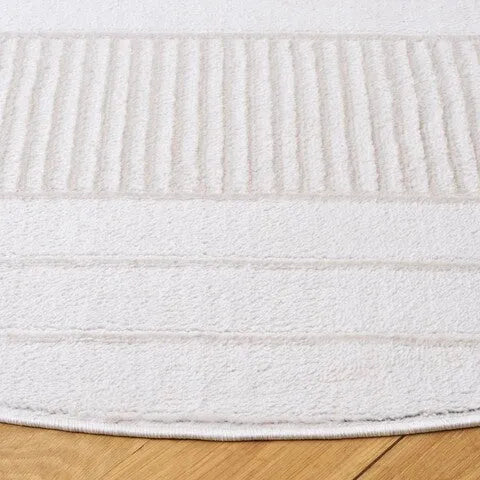 Archway Polypropylene Rug in Ivory with Oval Pattern