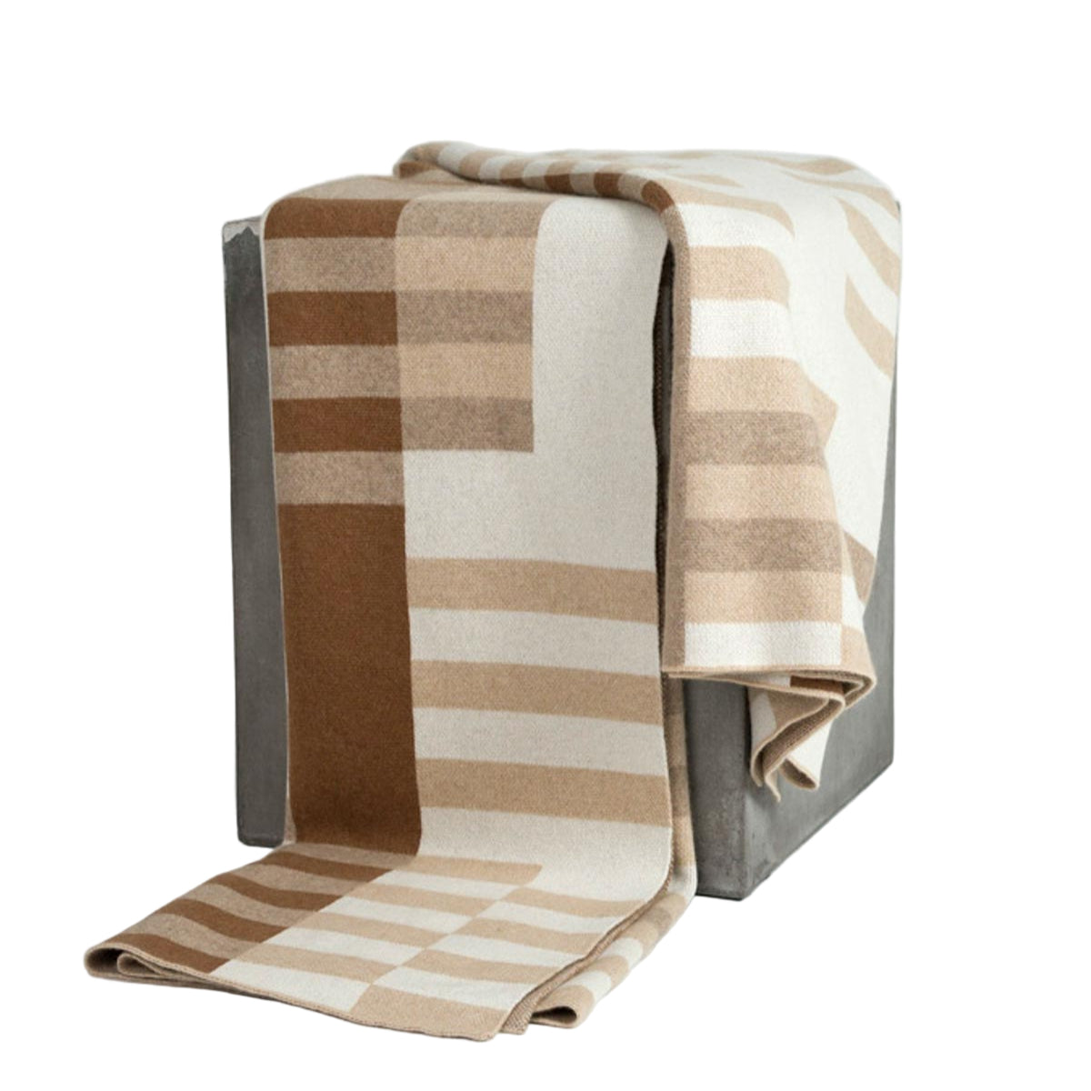 Checkered blanket draped over a wooden stool on a white background