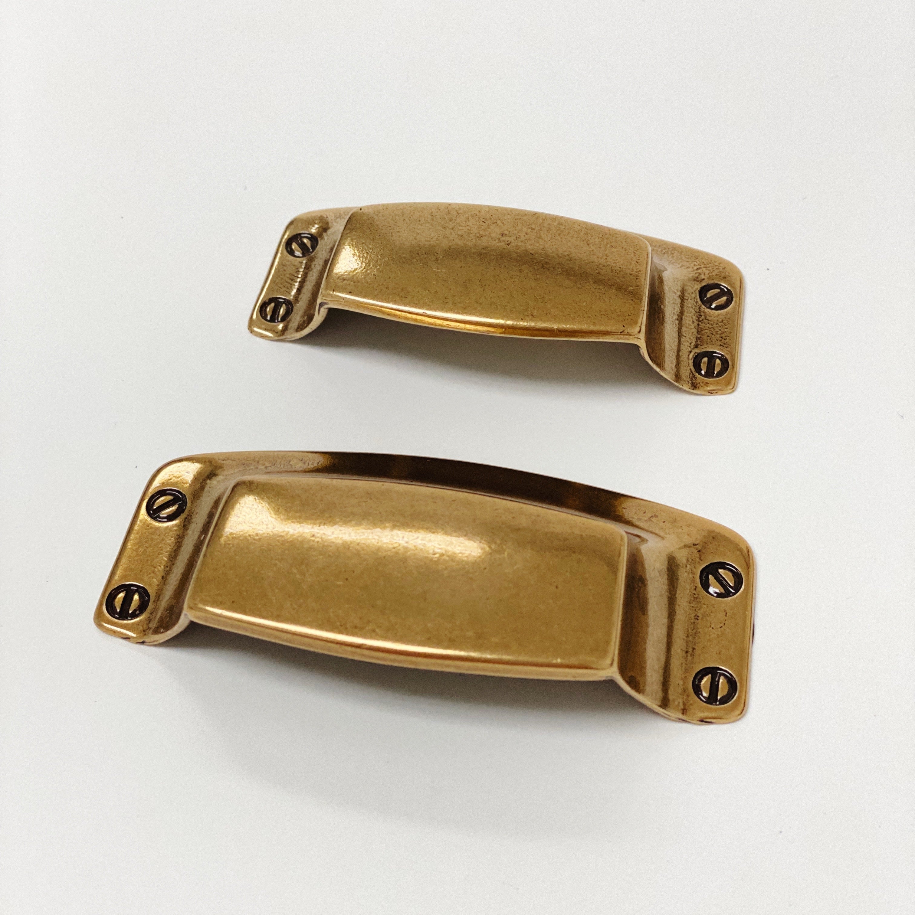 Drawer Cup Pull "Tuscany" in Antique Brass