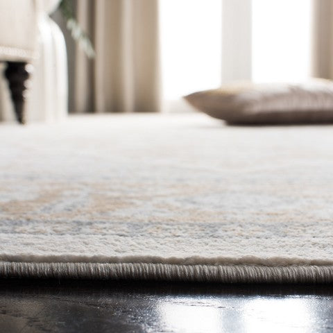 Isabella Polypropylene Rug in Cream and Beige